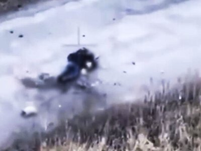 На Харківщині росіяни вбили двох мирних людей, які йшли під білим прапором (фото, 18+)