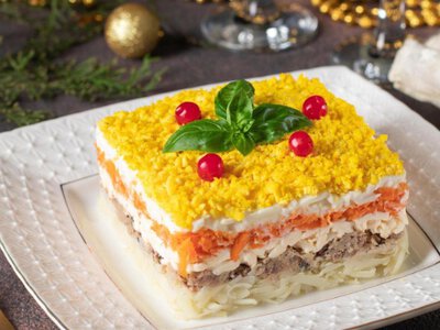 Як приготувати Мімозу на заправці з крем-сиру — інгредієнти та рецепт