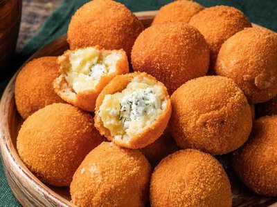 Ніжні пампухи з сиром, які змусять гостей просити у вас рецепти