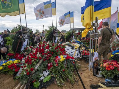 У Харкові попрощалися з рятувальниками, які загинули внаслідок російської атаки (фото)