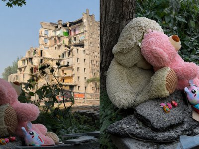 До місця удару в Дарницькому районі кияни несуть квіти та іграшки