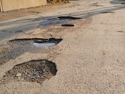 Ямы на дорогах в Харьковской области. Ремонты. Аварии. ДТП