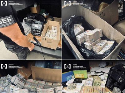 Пачки грошей заповнили весь багажник автівки