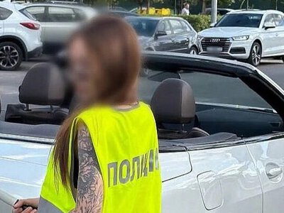 У Києві блогерку оштрафують на 34 тисячі за відео в поліцейському жилеті та з жезлом
