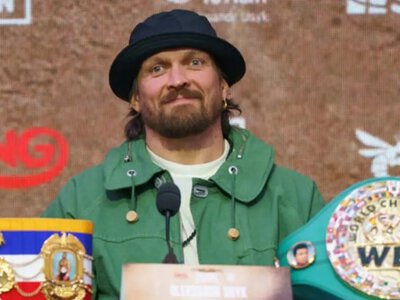 Усик отримав брудні погрози від російського боксера, який взяв до рук зброю (ФОТО)