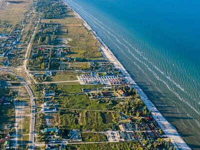  На окупованій Арабатській Стрілці зафіксували масштабні пожежі в районі котеджних поселень 