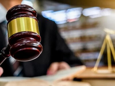 За колаборацію жительку Херсонщини заочно засудили до 10 років тюрми